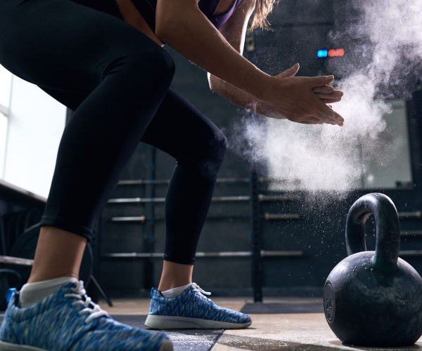 young-woman-lifting-kettlebells-in-crossfit-gym-min.jpg young-woman-lifting-kettlebells-in-crossfit-gym-min.jpg